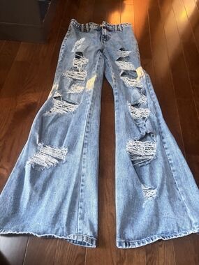 Women’s Light Blue Distressed Flare Jeans